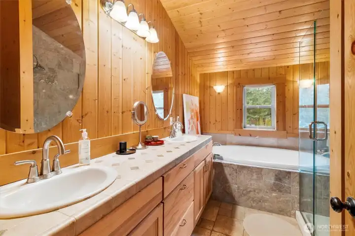 2nd floor full En-Suite bathroom with soaker tub, shower and double sink.