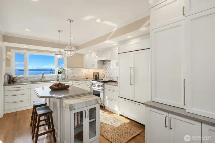 Every detail was thought of- there is a warming drawer, under cabinet outlets, spice cabinet, and more