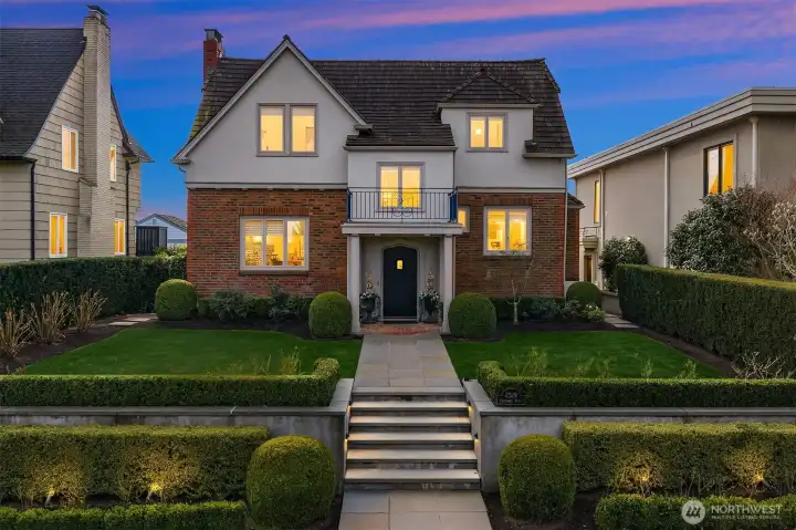 Outdoor lights set on sensors- notice the stair lights and the lights in the front garden.