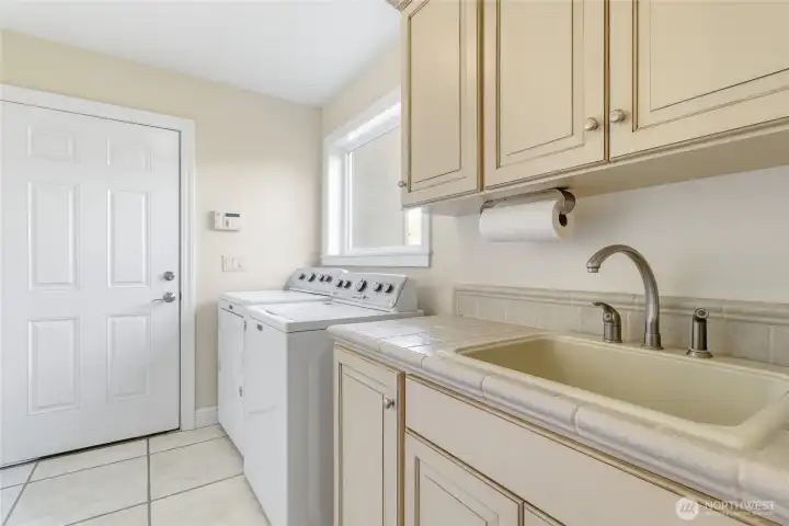 Laundry with Sink & Door to Garage