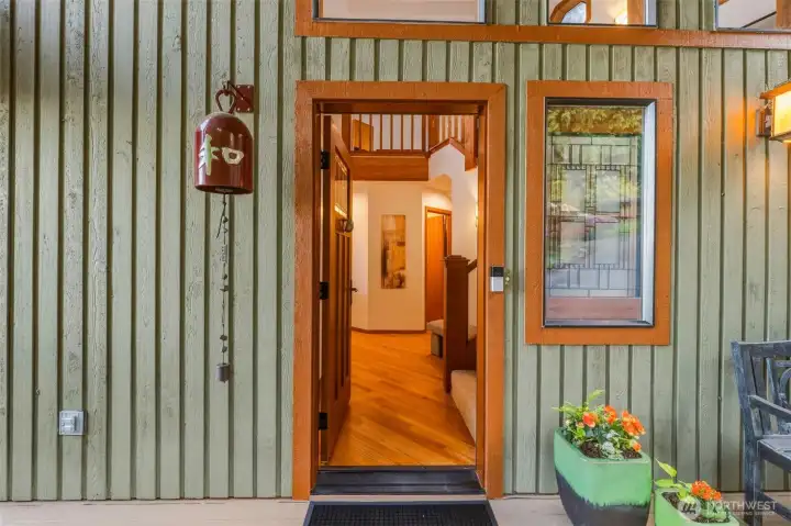 Thoughtfully designed front entry showcasing craftsman-inspired details and natural finishes.
