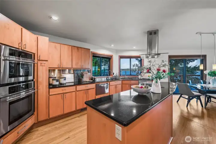 Well-designed kitchen with surrounding water outlooks.