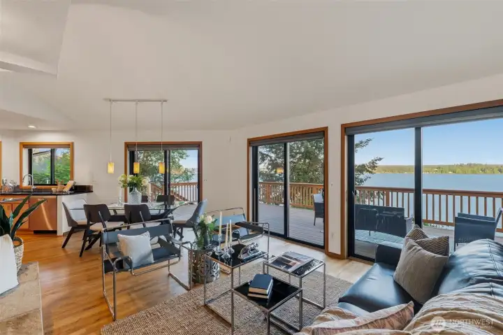 Inviting living and dining spaces positioned to enjoy panoramic waterfront scenery.