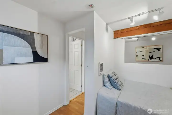 Flexible ADU layout with sleeping area and open living connection.