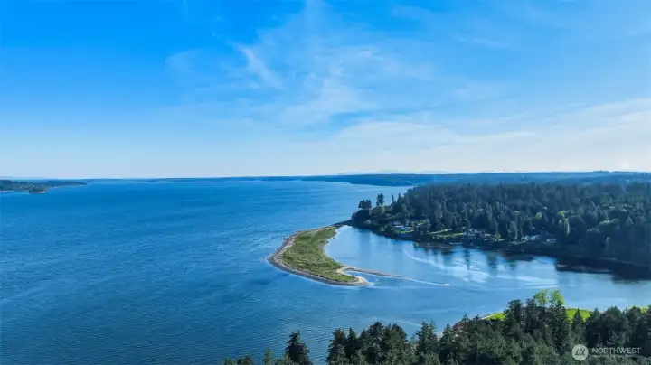 Sweeping aerial perspective showcasing the surrounding natural waterfront setting.