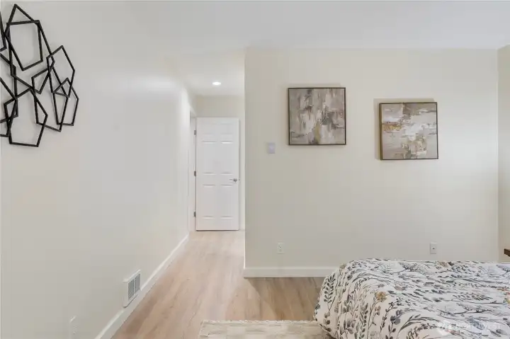Hall leads to the walk-in closet and ensuite bath