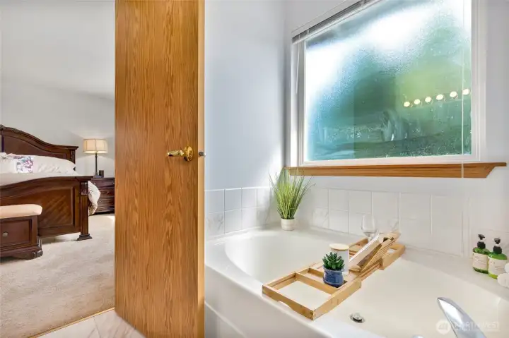 Cozy soaking tub and seperate shower