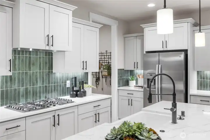 Photos are of the model home. Finishes and colors may vary.