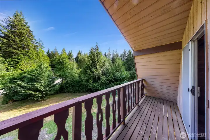 All 4 upstairs bedrooms have slider access to covered balconies and beautiful views