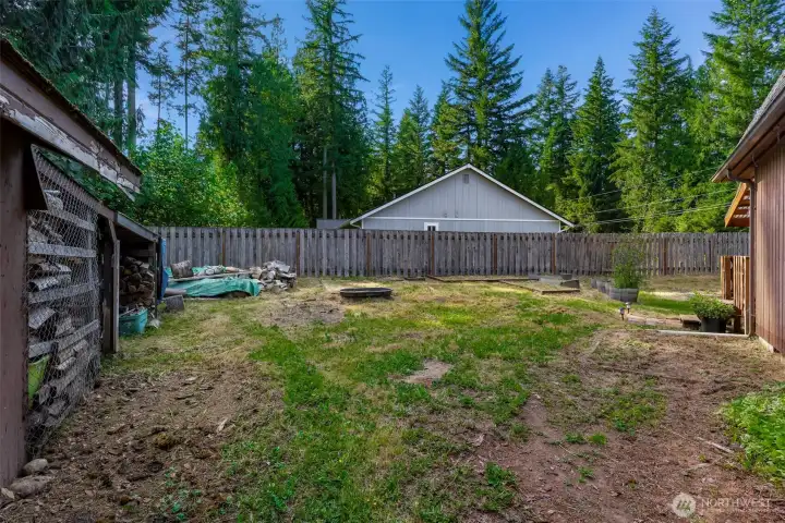 Fully fenced yard provides space and privacy