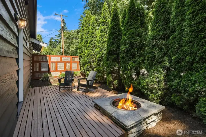 Wood deck off the primary suite *Maybe a sauna or hot tub?*