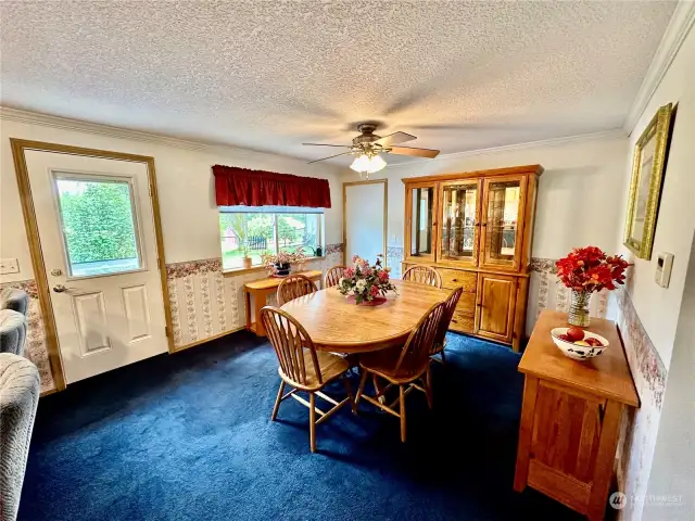 The dining room offer easy access to the rear deck and backyard.