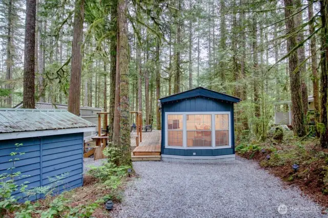 Lot with a cozy trailer and shed