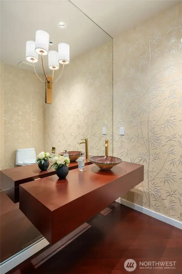 Updated powder bath right off the main living space for guest.