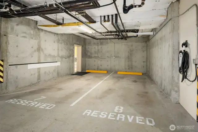Home opens right out to your two parking spaces with a 220v charging station was added to one of the two parking spaces. Your two storage units all have lighting that the seller added as well.