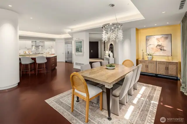 Formal dining with a gorgeous glass chandelier.