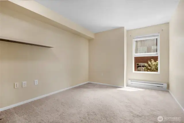 2nd bedroom with great light. un-staged