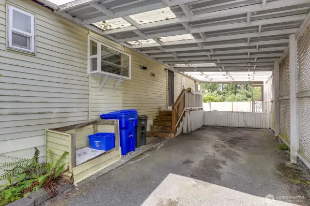 Space for 2 tandem parking spots and a covered garage