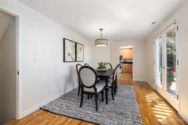 Dining area located between the kitchen and living area.