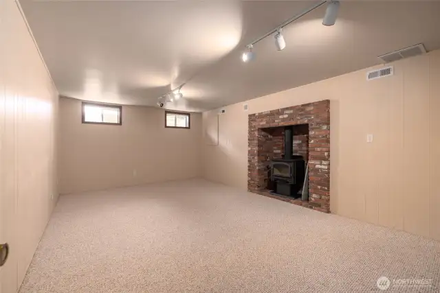 Extra room downstairs has a wood fired wood stove.