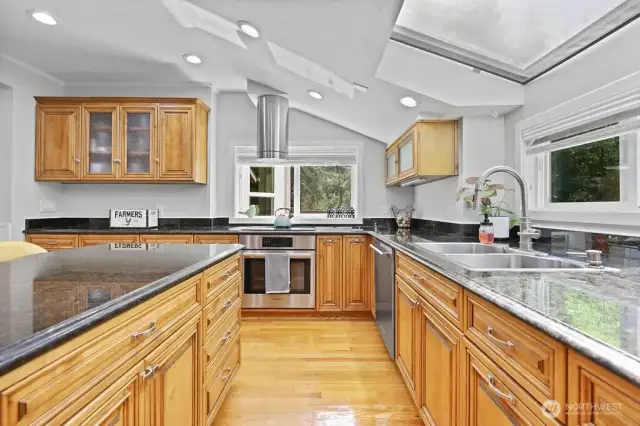 Kitchen - slab granite over quality wood cabinets