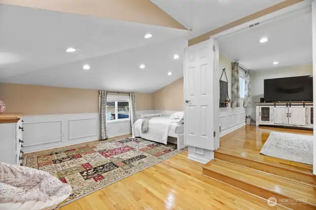 Main floor bedroom adjacent to family room