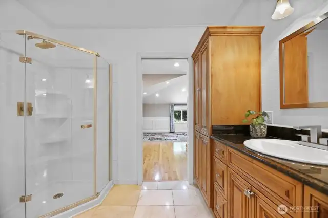 Continental bath adjacent to main floor bedroom
