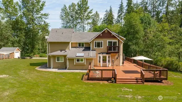 House, deck, chicken coop from yard