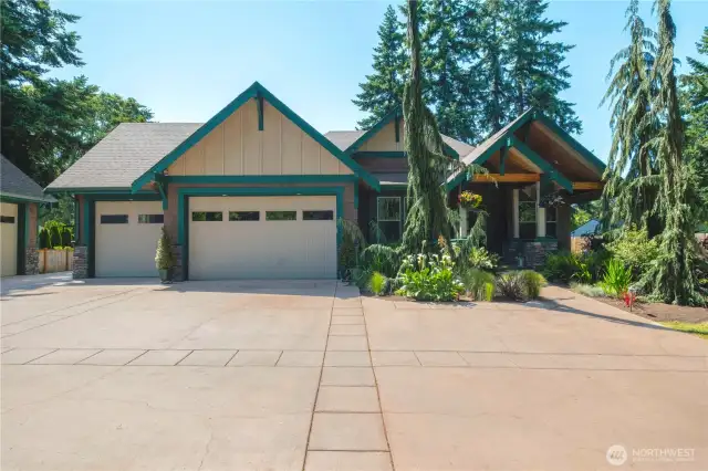 The 3 car attached garage has 9' tall doors.