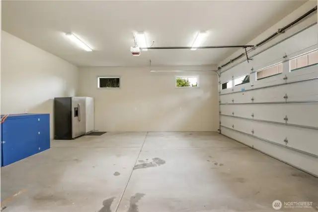 Detached 4 car wide shop.