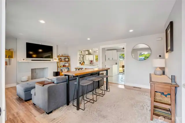 Open entry view of living and kitchen