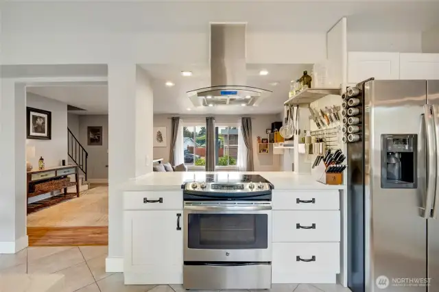 Updated cabinets, marble countertops and SS appliances