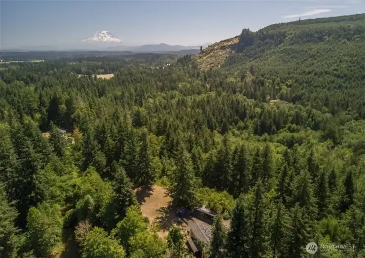 Aerial of mountain the house is bottom center of shot