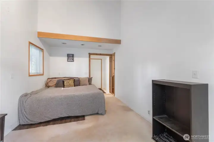 Former ADU was converted to a large primary suite (easily reverted). Behind the bed is all of the plumbing connection for the kitchen