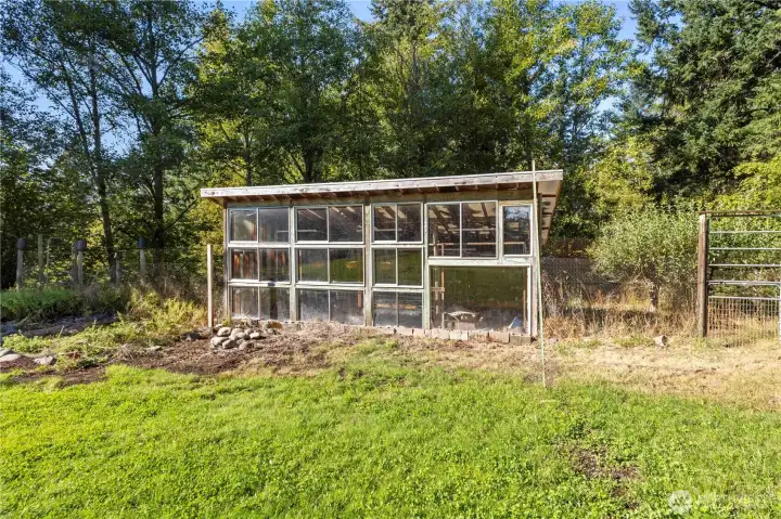 Greenhouse, productive garden, fruit trees
