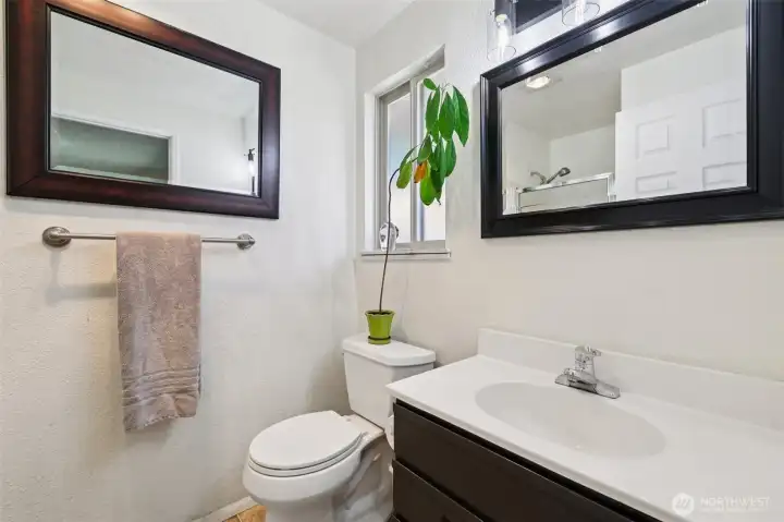 Primary has a private 3/4 bath.