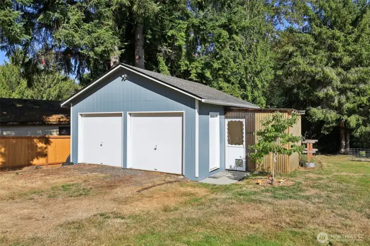 Detached 2-car garage/workshop with power and a greenhouse in the backyard. Park your golf-cart, motorcycle, etcc.