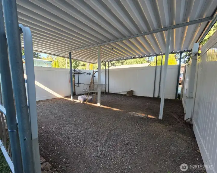 HUGE carport enclosed on three sides with doors