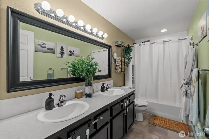 Full bath with double sinks