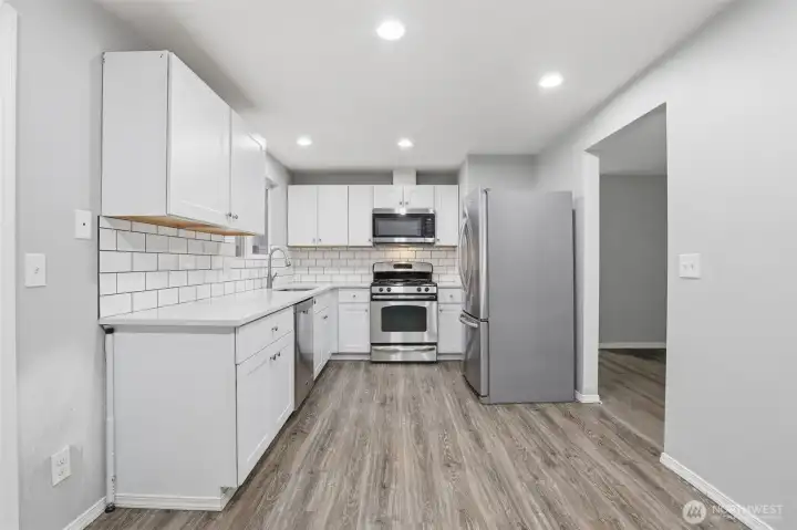Updated white cabinets and subway tile