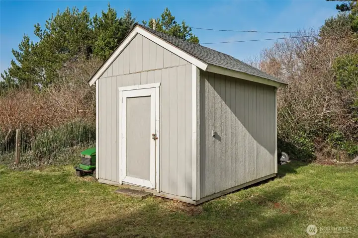 Adequate storage shed for all your beach toys or extra storage space