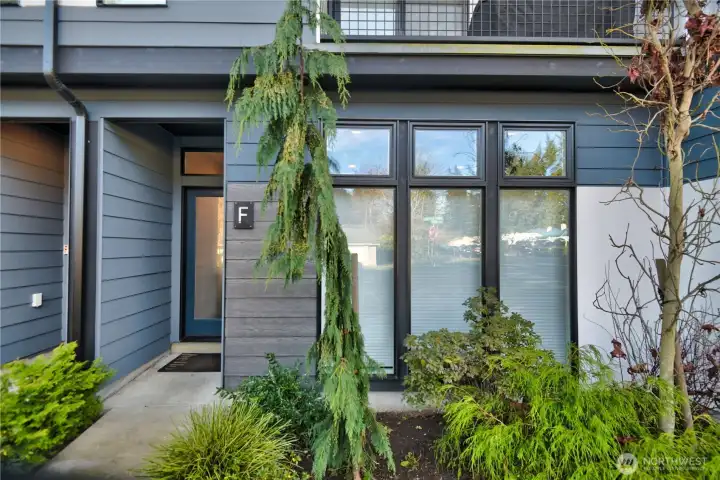 Beautiful Entry with professional landscaping.