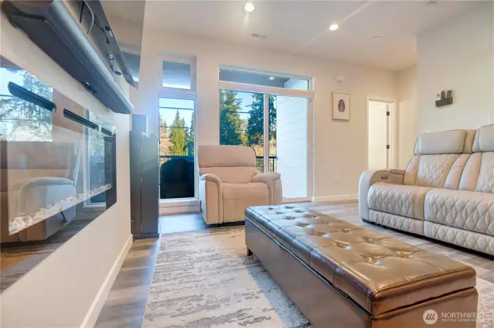 Main living level with electric fireplace for ambiance and can also heat.