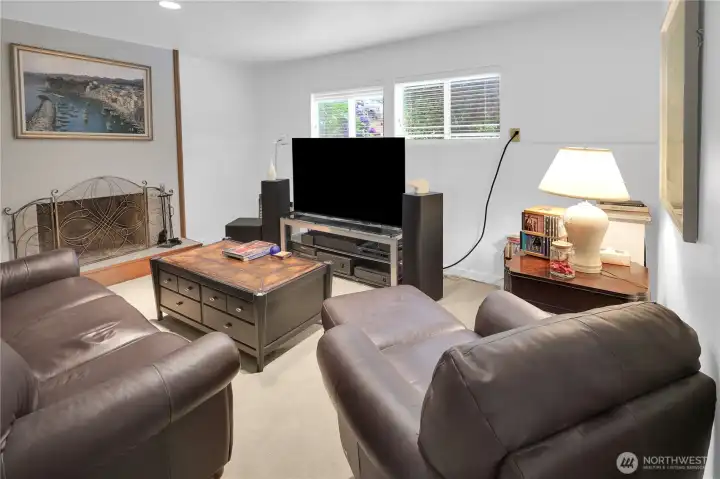 Lower level bedroom is spacious! Currently used as a media and game room with fireplace but it is a second suite! What will use this flexible floor plan for?