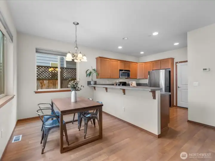 Dining nook adjacent to kitchen - perfect for entertaining