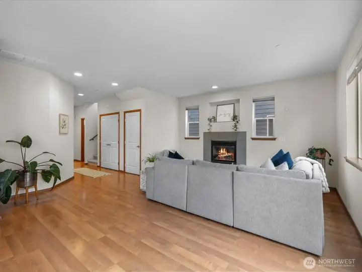 Experience effortless living in this bright expansive room, with its generous proportions and seamless flow into the rest of the home. This view if from the dining area towards the living area.