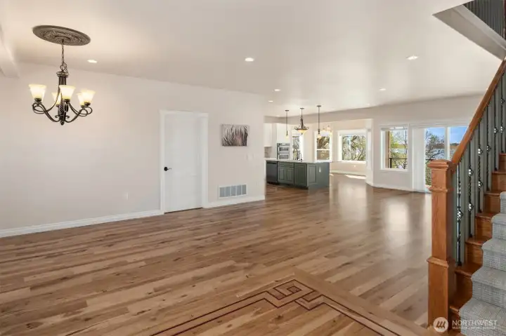 Gleaming hardwoods grace the main floor living spaces