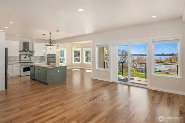 Gather and enjoy this elevated kitchen and dining area with walls of windows Gather and enjoy this elevated kitchen and dining area with walls of windows