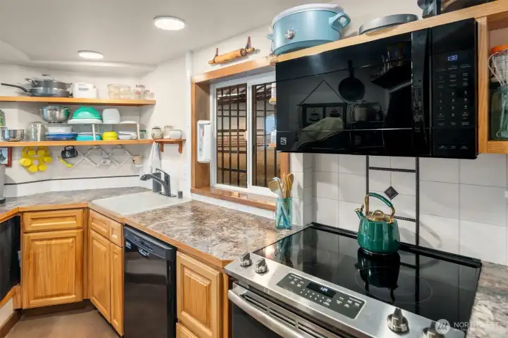 Barn kitchen with viewing to indoor arena Barn kitchen with viewing to indoor arena