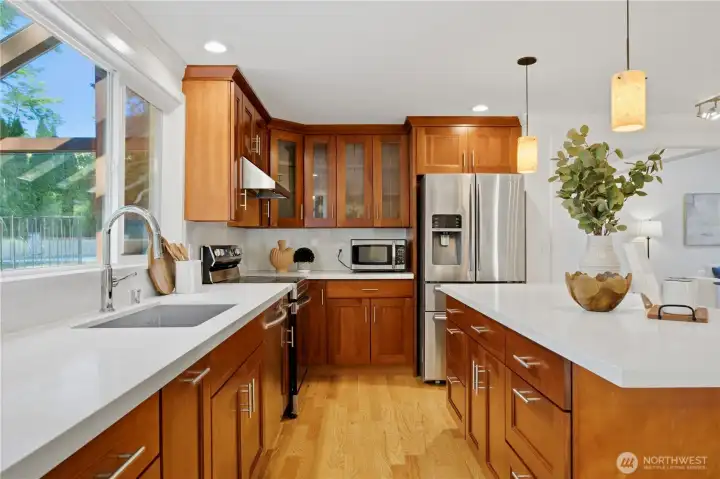 Beautifully updated kitchen ft. new quartz countertops and new sink